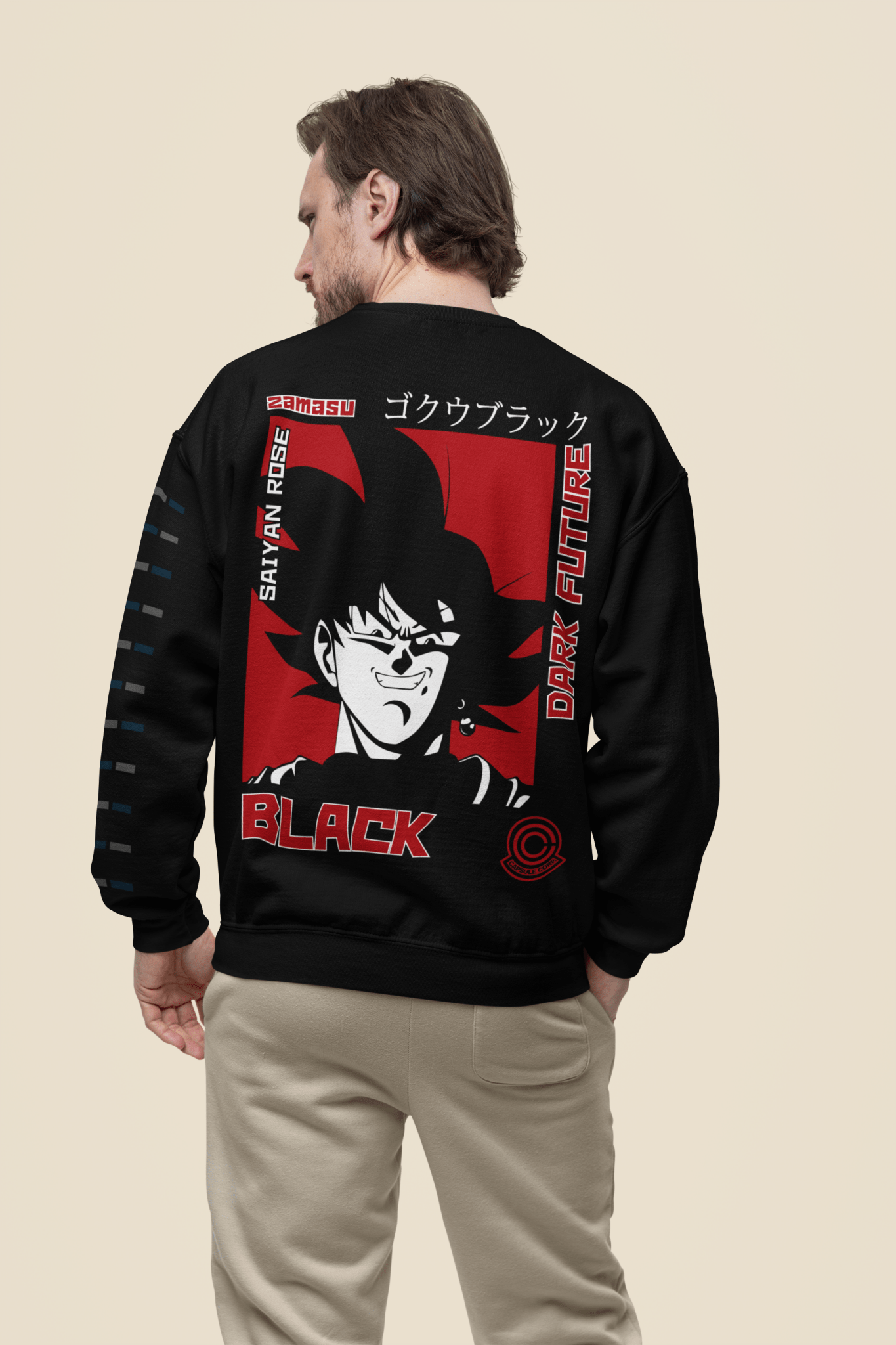 Back view of a man wearing a black Gildan sweatshirt featuring anime graphic and bold text in a studio